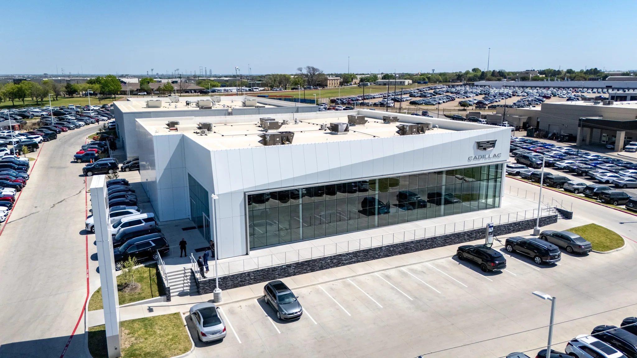 Aerial view of the Clay Cooley Cadillac showroom and inventory lots in Mesquite, Texas, built by The Charles Morgan Group