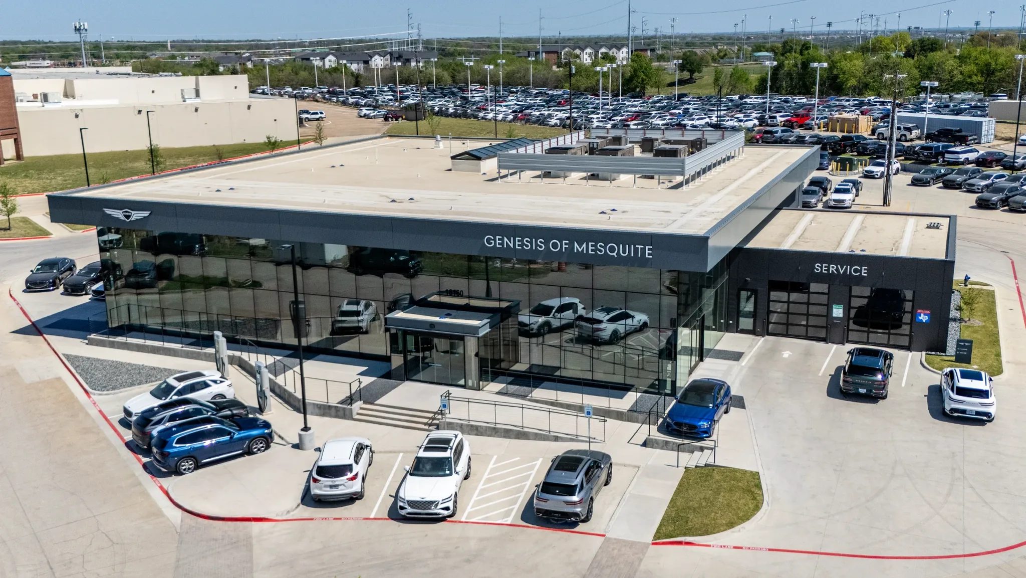 Aerial view of Clay Cooley Genesis of Mesquite in Mesquite, Texas, showing the showroom and service entrance, built by The Charles Morgan Group