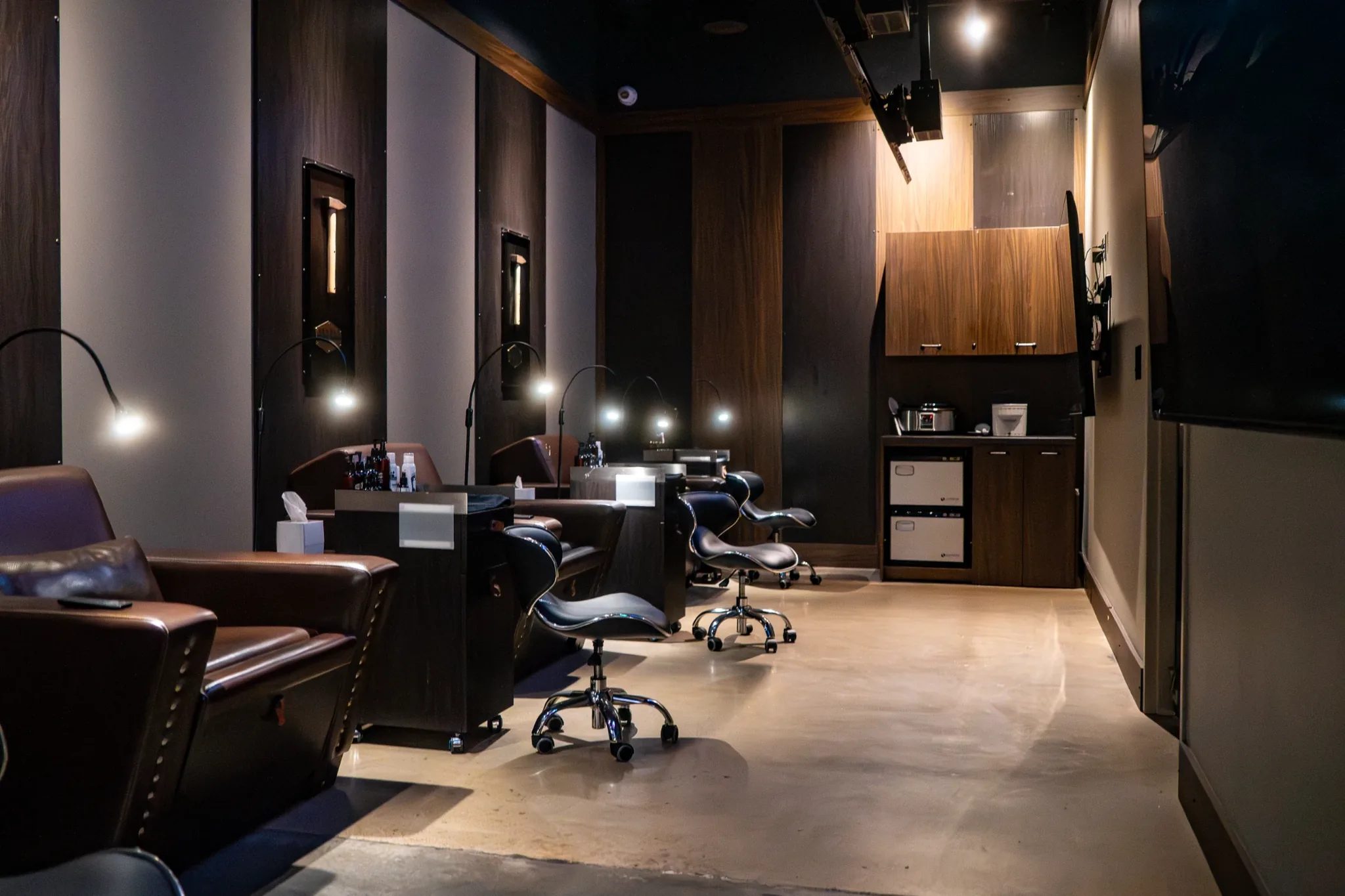 Hand and foot treatment room with leather recliners at Hammer & Nails Grooming Shop for Guys in Mansfield, Texas, built by The Charles Morgan Group