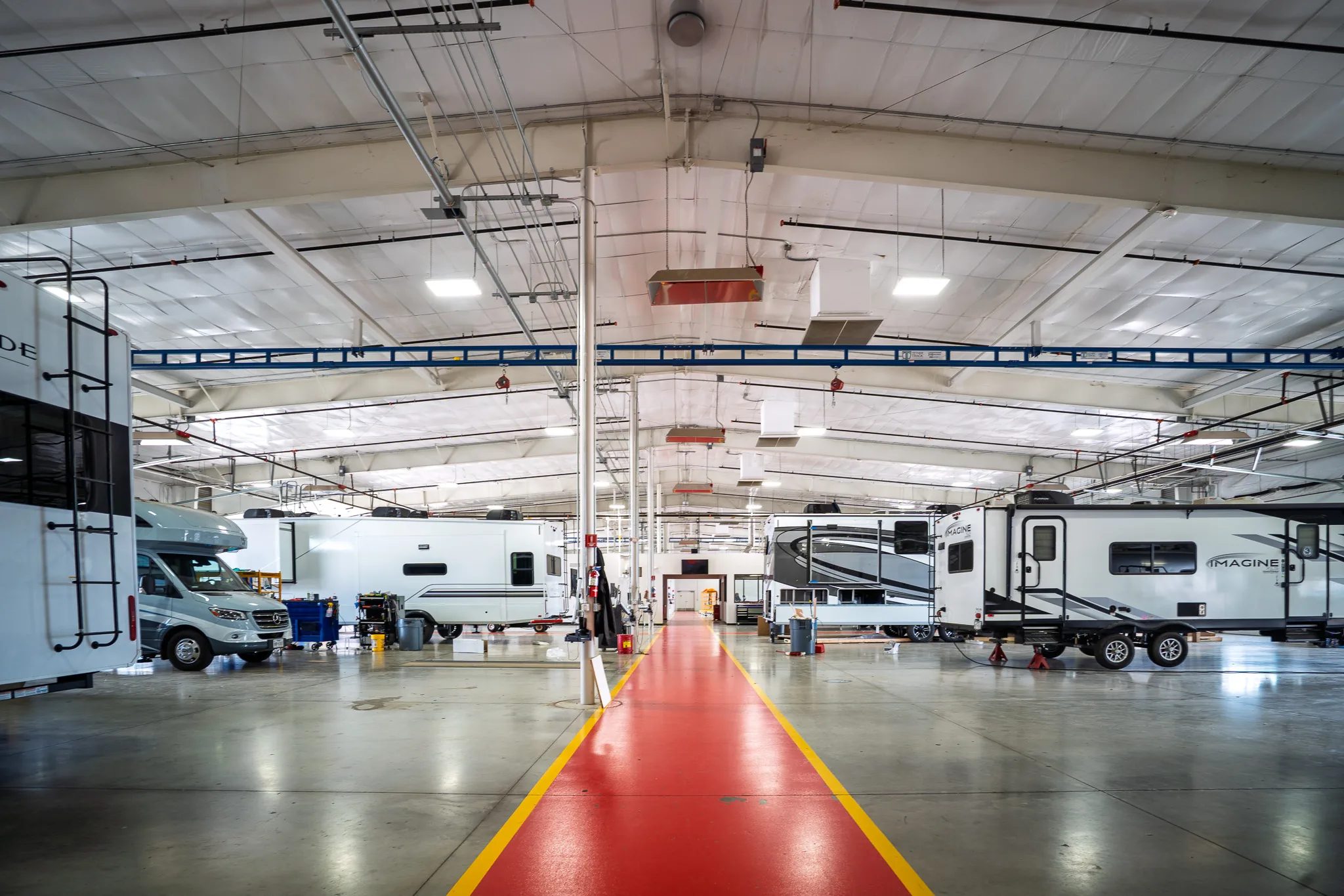 RV service shop with travel trailers in the bays at McClain's RV SuperStore in Sanger, Texas, built by The Charles Morgan Group